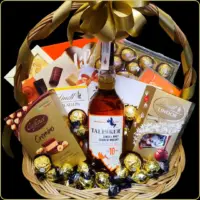 poklon korpa talisker single malt viski i luksuzne cokolade ferrero lindt belgian