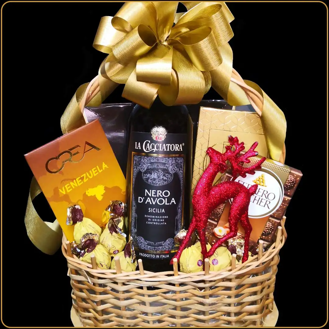 novogodišnji poklon nero sa vinom i čokoladom u pletenoj korpi