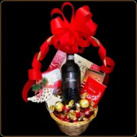 novogodisnji poklon grazia sa crvenim vinom i cokoladama