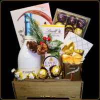 novogodisnji poklon pahulja sa jp chenet vinom i ferrero cokoladama u gajbici