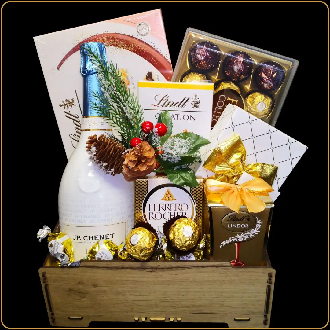 novogodisnji poklon pahulja sa jp chenet vinom i ferrero cokoladama u gajbici