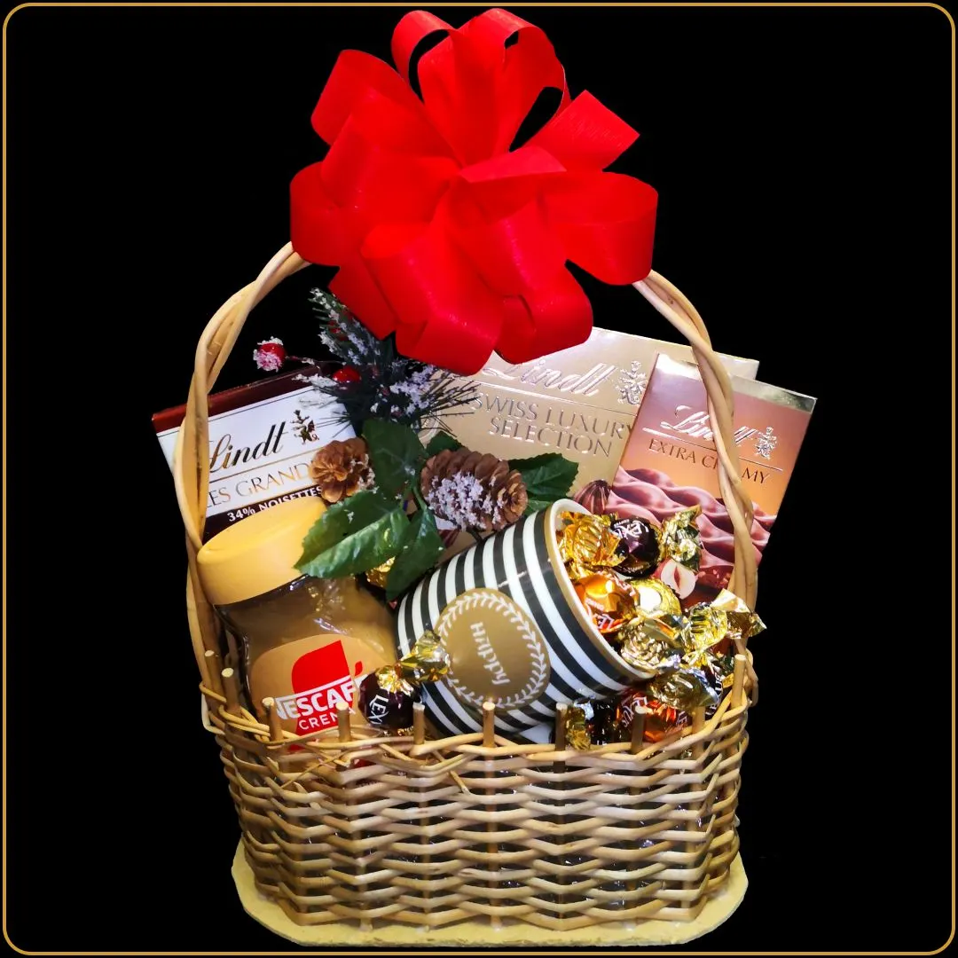 novogodišnji poklon nes sa kafom lindt čokoladom i šoljom