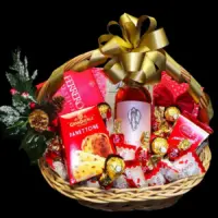 Novogodišnji poklon Lindor sa Grape Angel Merlot Rosé vinom, Panettone kolačem i čokoladama u pletenoj korpi