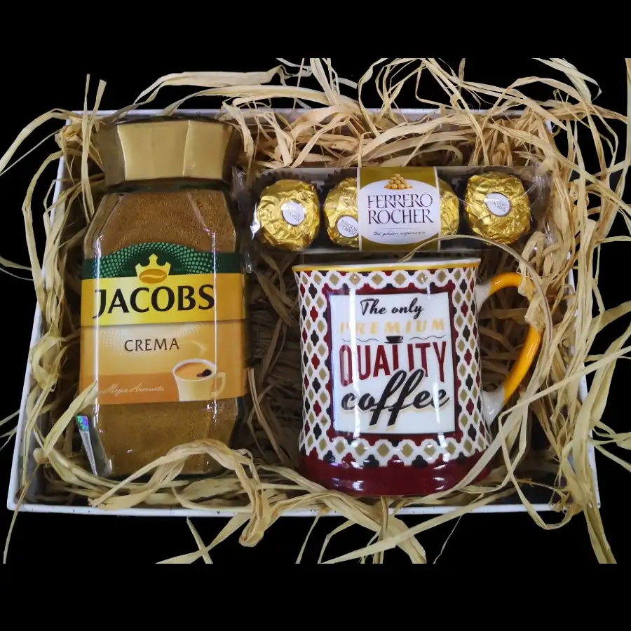 Set Coffee sa Jacobs Crema kafom, jednom šoljom i Ferrero Rocher pralinama u ukrasnoj kutiji sa rafijom